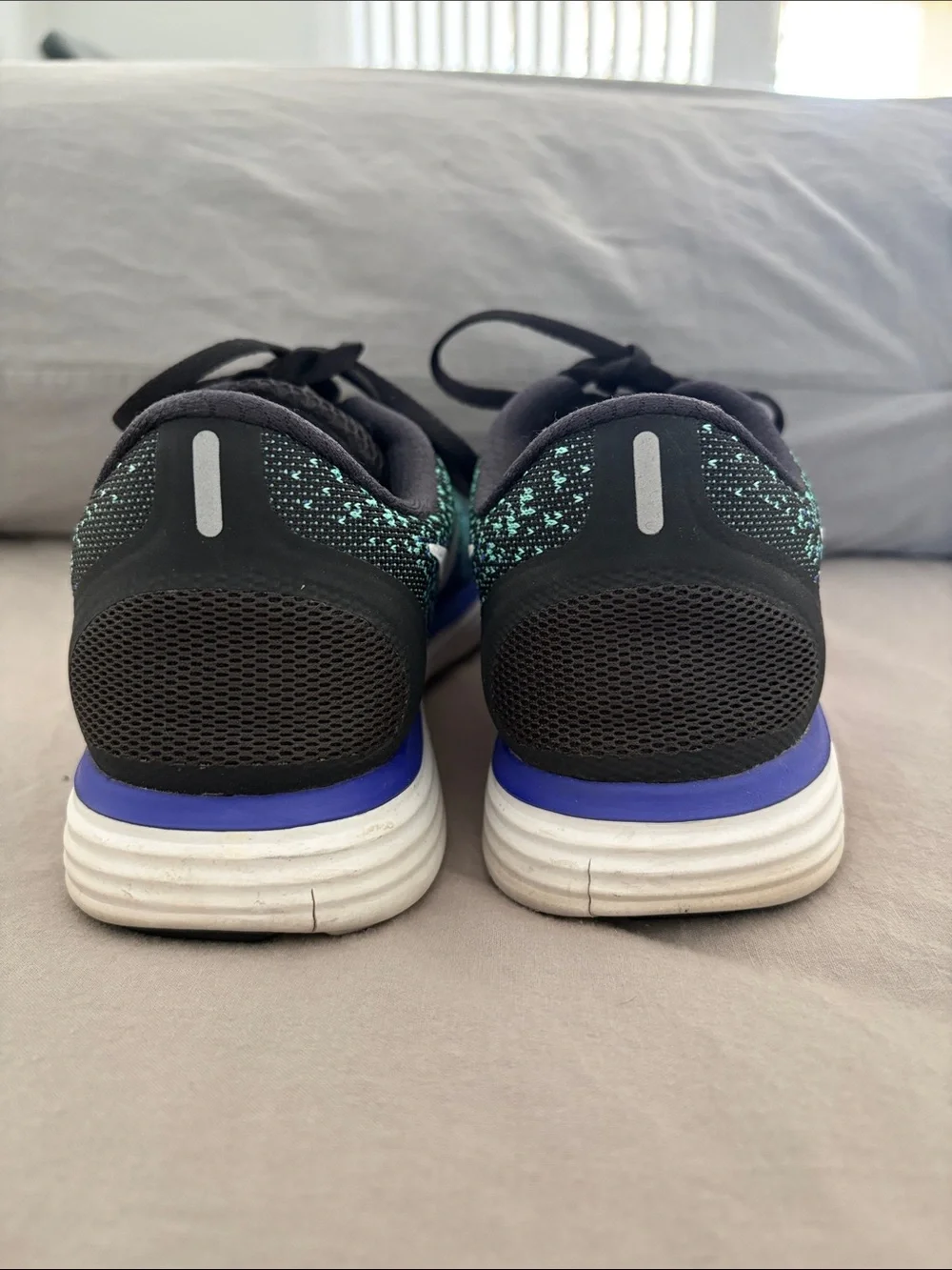 Nike Women's Black Teal Purple Knit Running Shoes with White Swoosh